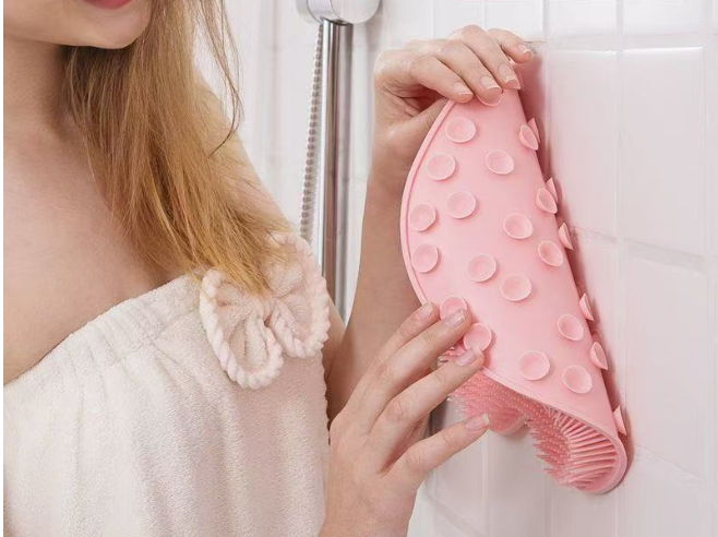 Scrub mat for feet and body in the shower